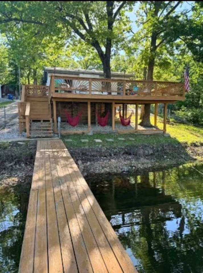 Granary‑house‑backyard‑deck‑hammocks‑lake‑view