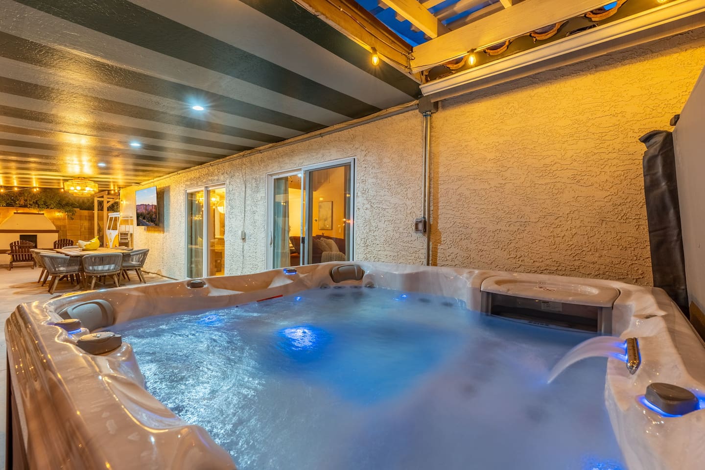 The custom lights and the sound of the waterfall of the hot tub are sure to take the stress away.