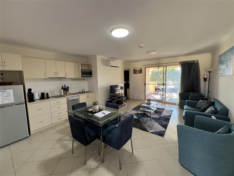 Open plan features full kitchen with coffee pod machine