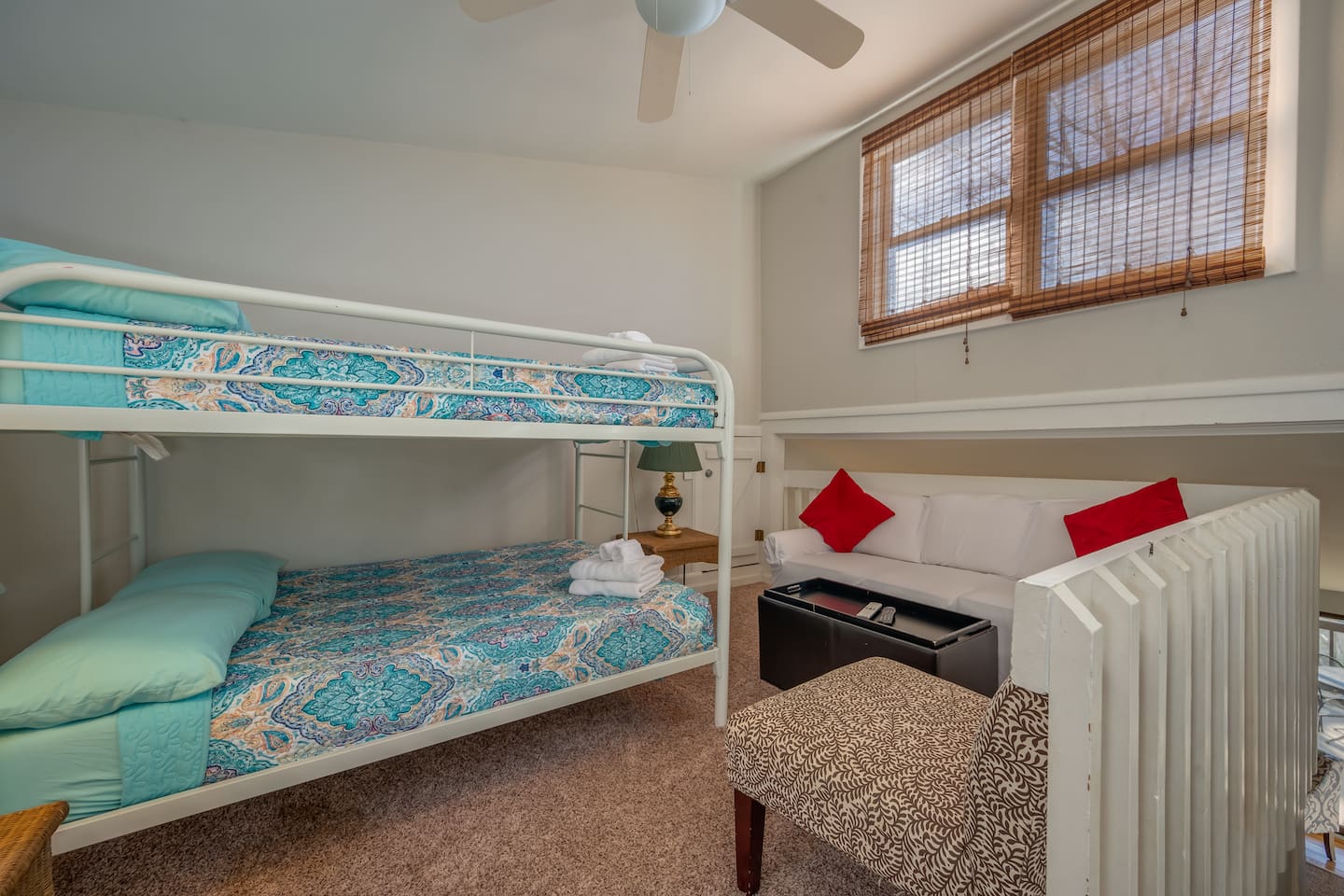 Upstairs loft with full bed bunk and seating