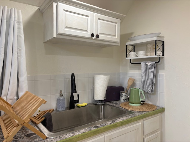 Moldavite Portal Kitchenette with all the essentials for effortless dining, morning rituals, and simple moments of nourishment. 