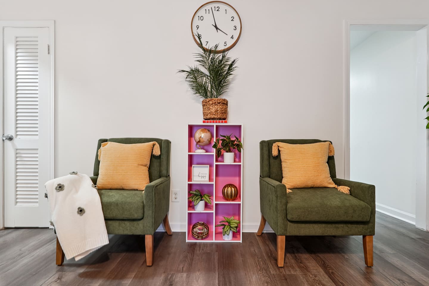 The living room features cozy furniture, including a comfortable blue couch, and an Amazon Fire-powered Smart TV for your entertainment. You’ll also find the Xfinity modem conveniently located here, convenient for ethernet connection.