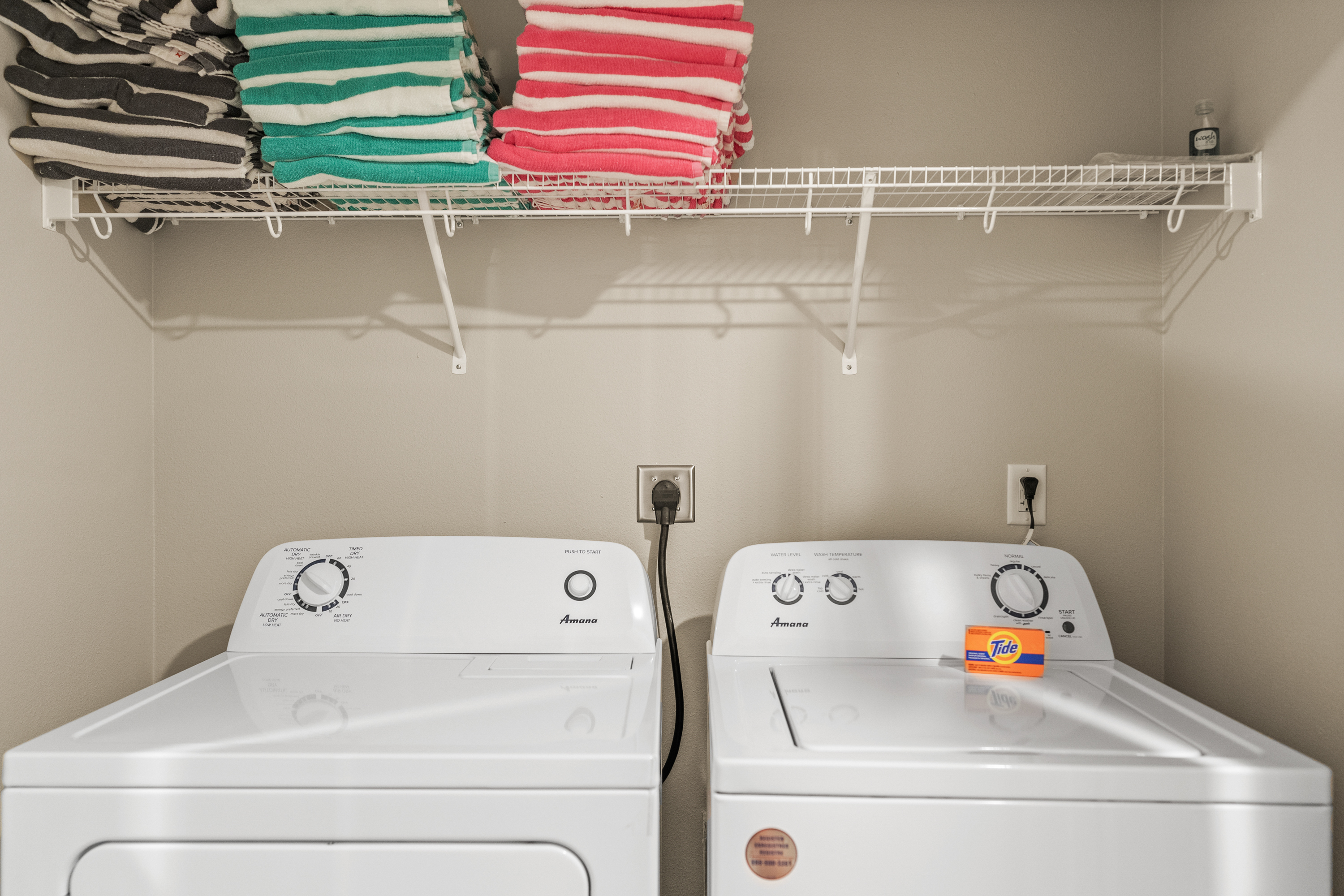 Lower-level Laundry Room with washer and dryer.
