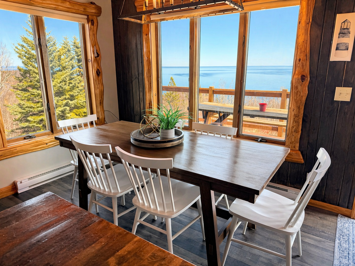 Start your morning gathered around the dining room table with coffee, and a front row seat to Lake Superior. With wide open lake views and beautiful sunrise light pouring in, this is the kind of North Shore moment that makes a getaway feels unforgettable.