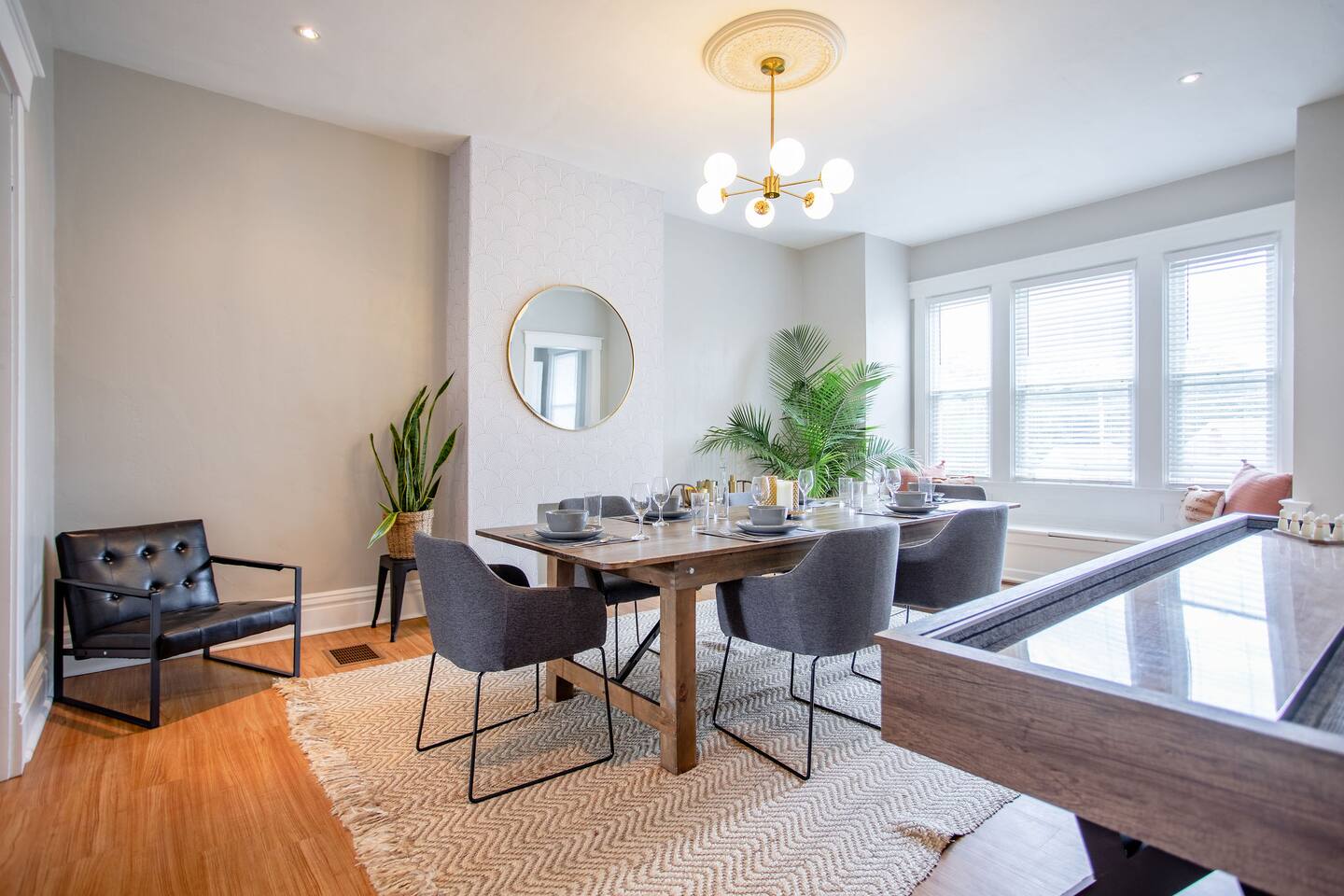 Bright and inviting dining area with a 6-seater table, perfect for family meals, entertaining guests, or enjoying a cozy dinner with plenty of space.