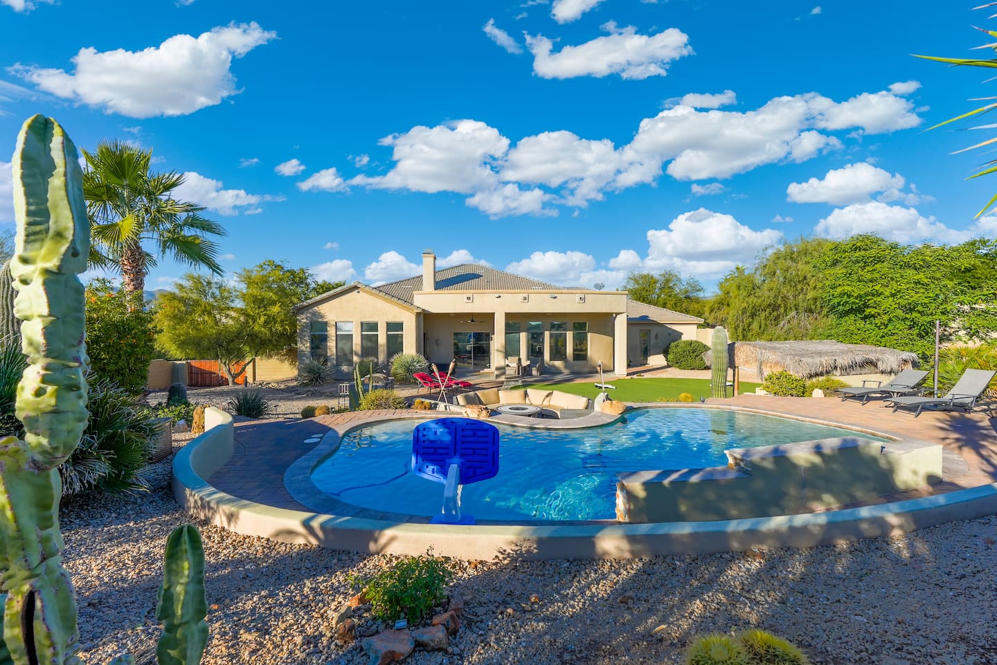 Bright daytime pool views with plenty of space to swim, lounge, and unwind.