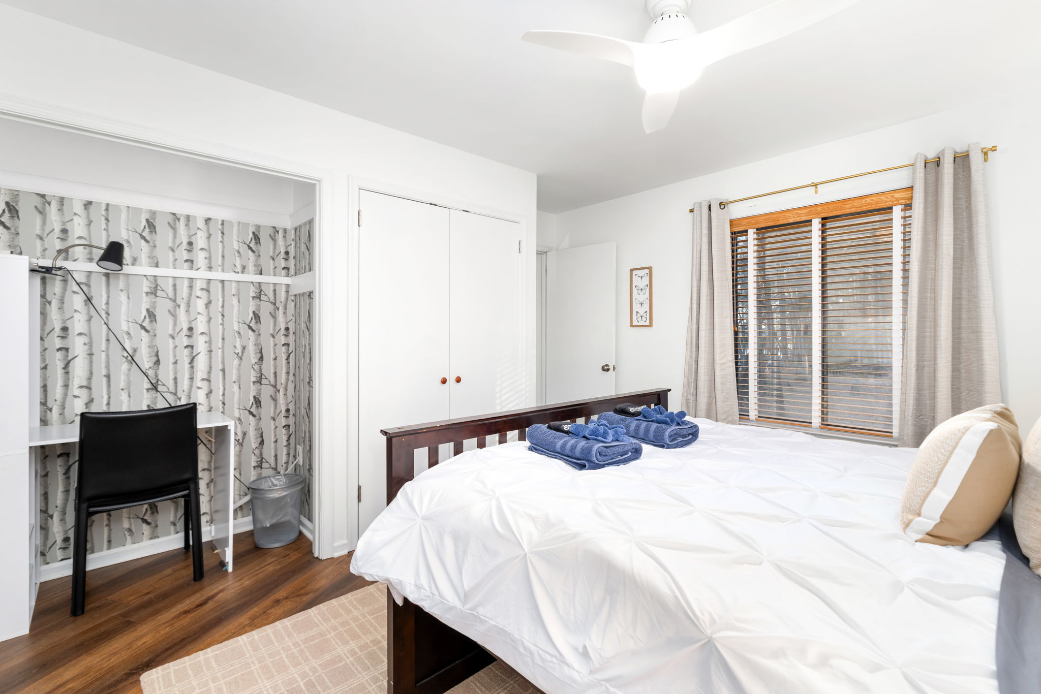 Queen Bedroom 2 with Trundle: Relax in style with a delightful bed, stylish decor, and natural light!