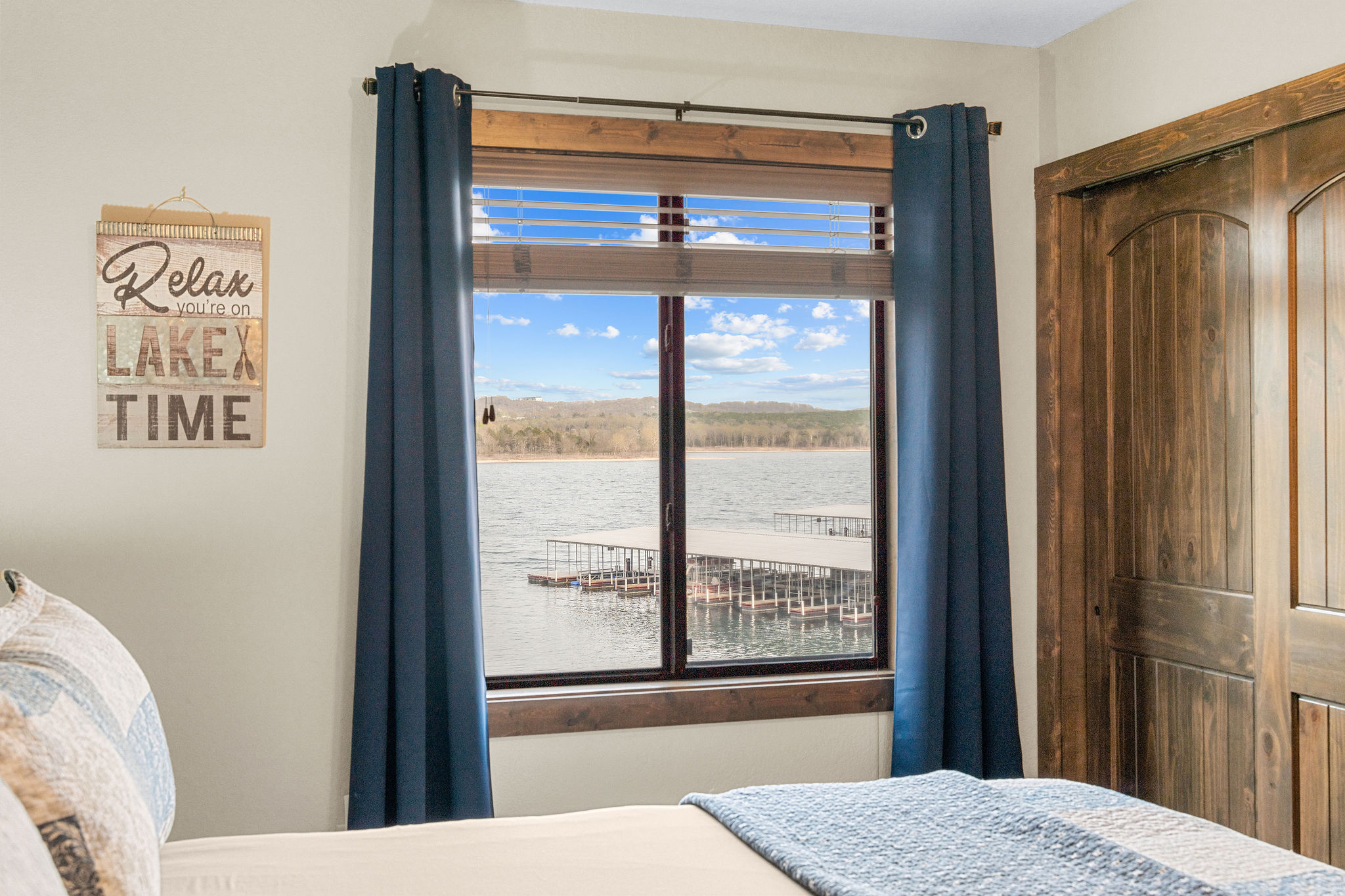 Watch the lake waves from the bed. 