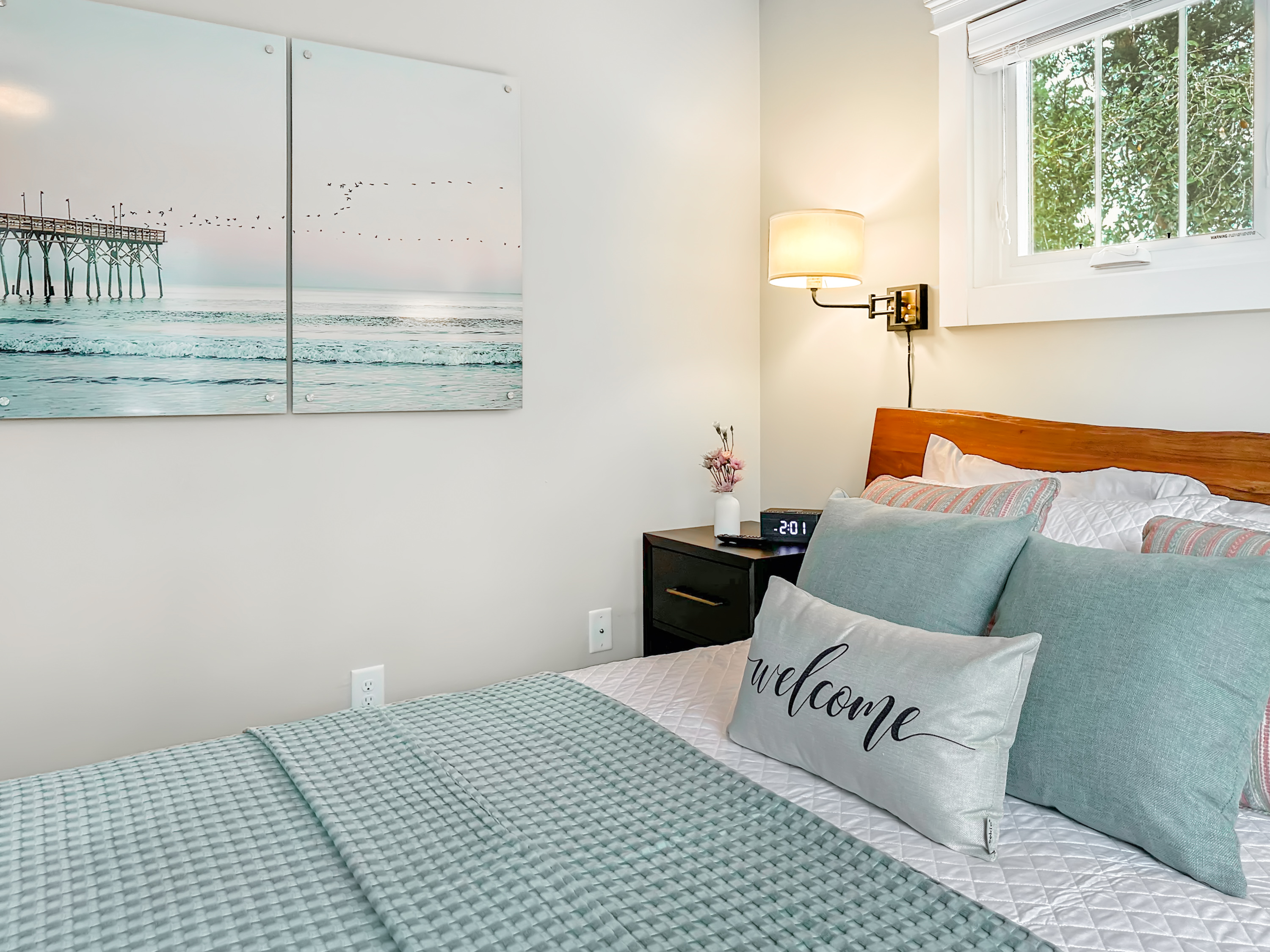 Fresh linens and natural light... so welcoming!