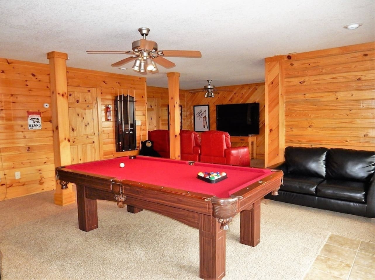 Pool table and movie room with recliner seats! 