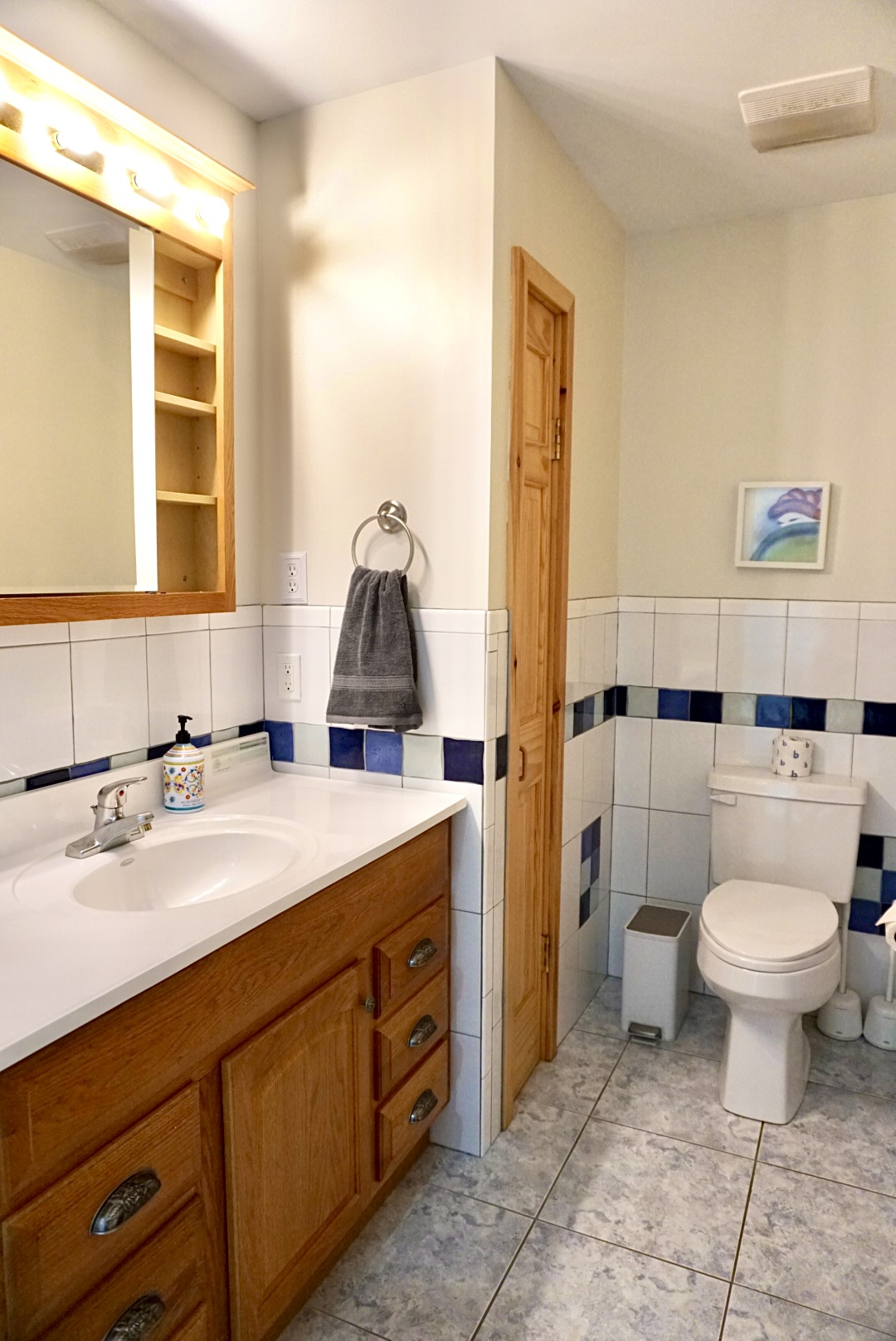 Bright tiles and elegant fixtures create a fresh space for relaxation and refreshment!