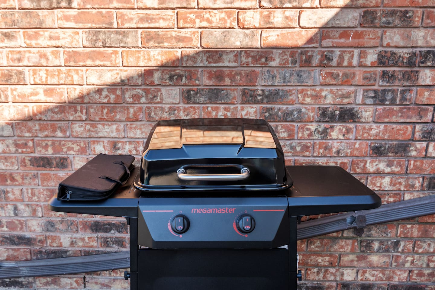 Grill up your favorites on the backyard BBQ just steps from the sunroom—perfect for outdoor dining and entertaining under the Texas sun.