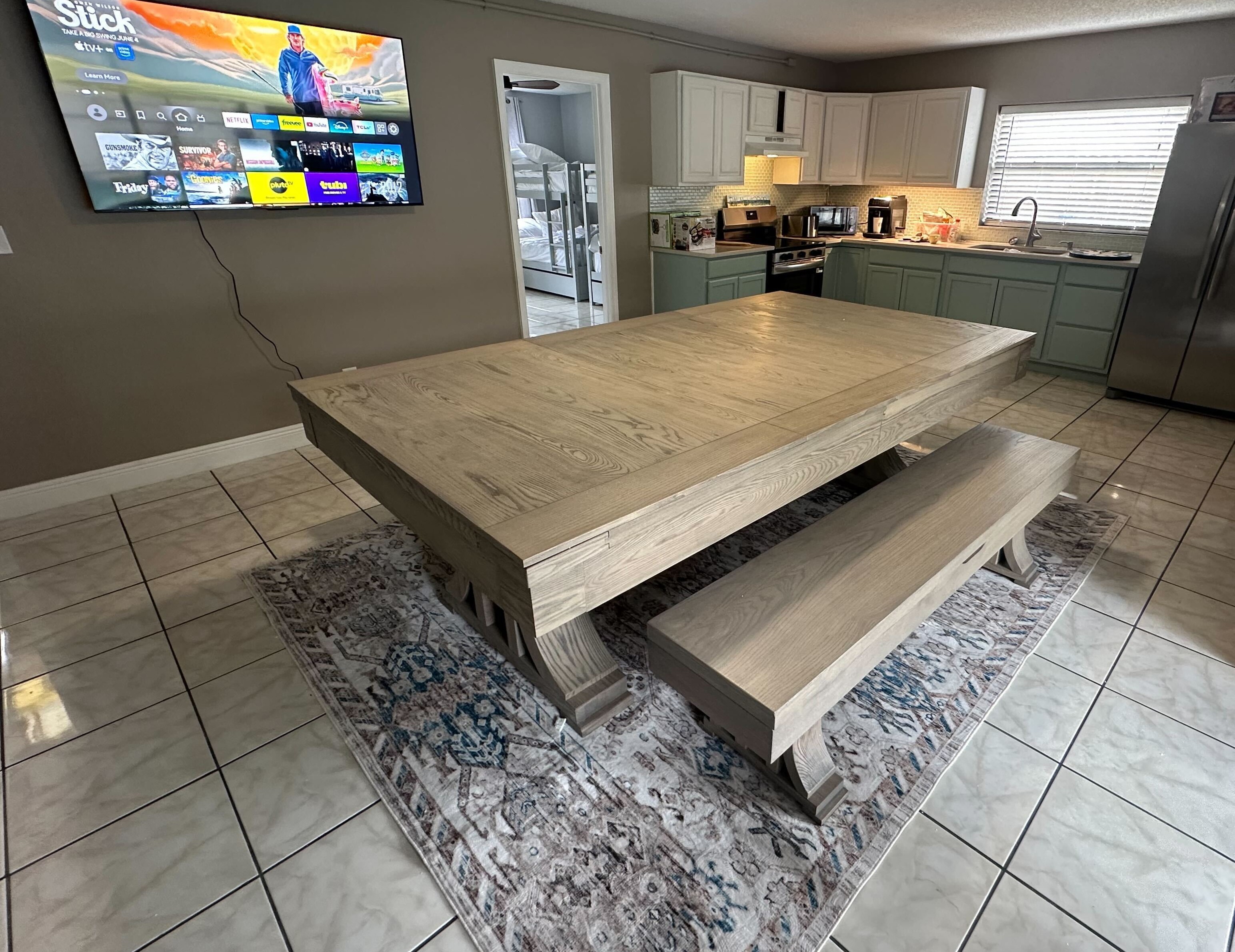 8' Slate Pool Table + Dining Combo Stylish wood table doubles as a full-size slate pool table with lavender felt—perfect for meals, games, and memory-making!