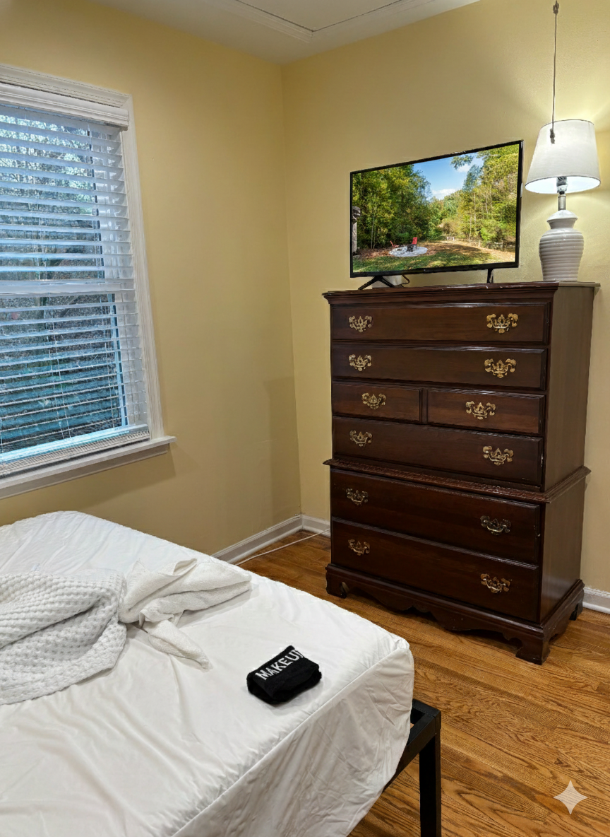 Smart TV is available inside Upstairs Queen Bedroom