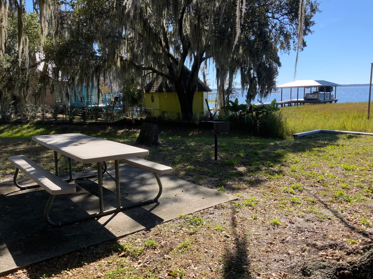 Picnic table and charcoal grill