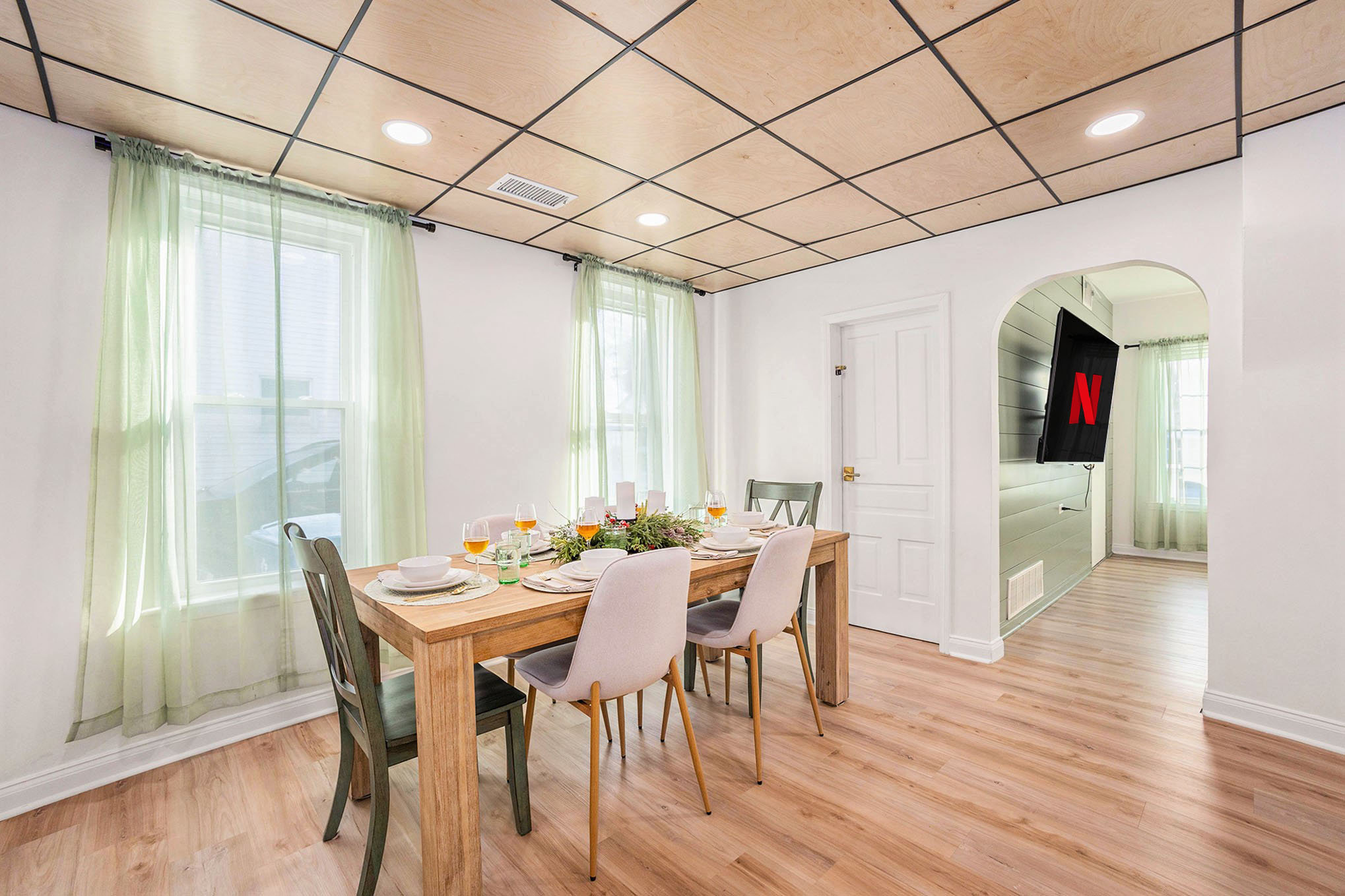 Dine in comfort surrounded by natural textures and warm wood accents