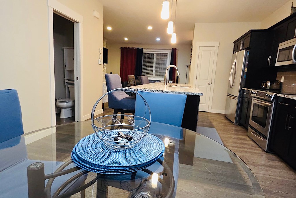 Dining room off the kitchen, seating for 4. 