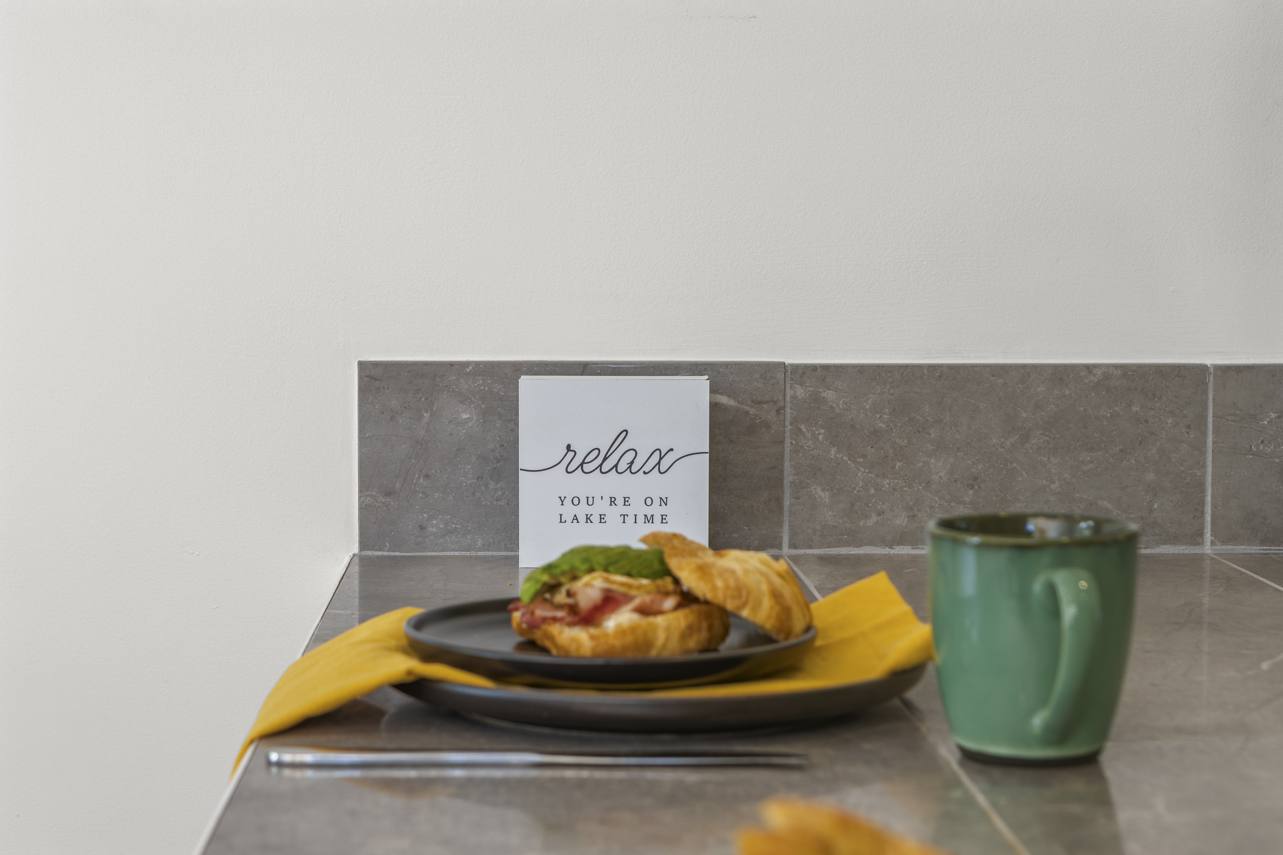 Full Kitchen: Savor delicious bites with a lakeside view and inviting decor!