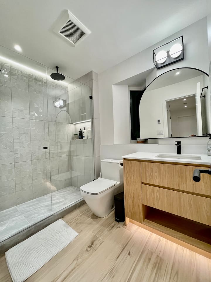 2nd floor bathroom w/rain can shower head, wand, heated floors, LED accent lighting
