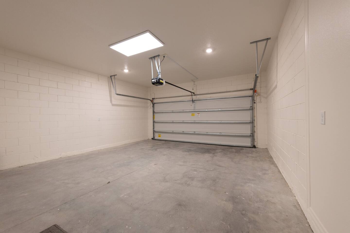Two car garage can be used for storage, trailers and extra cars. 