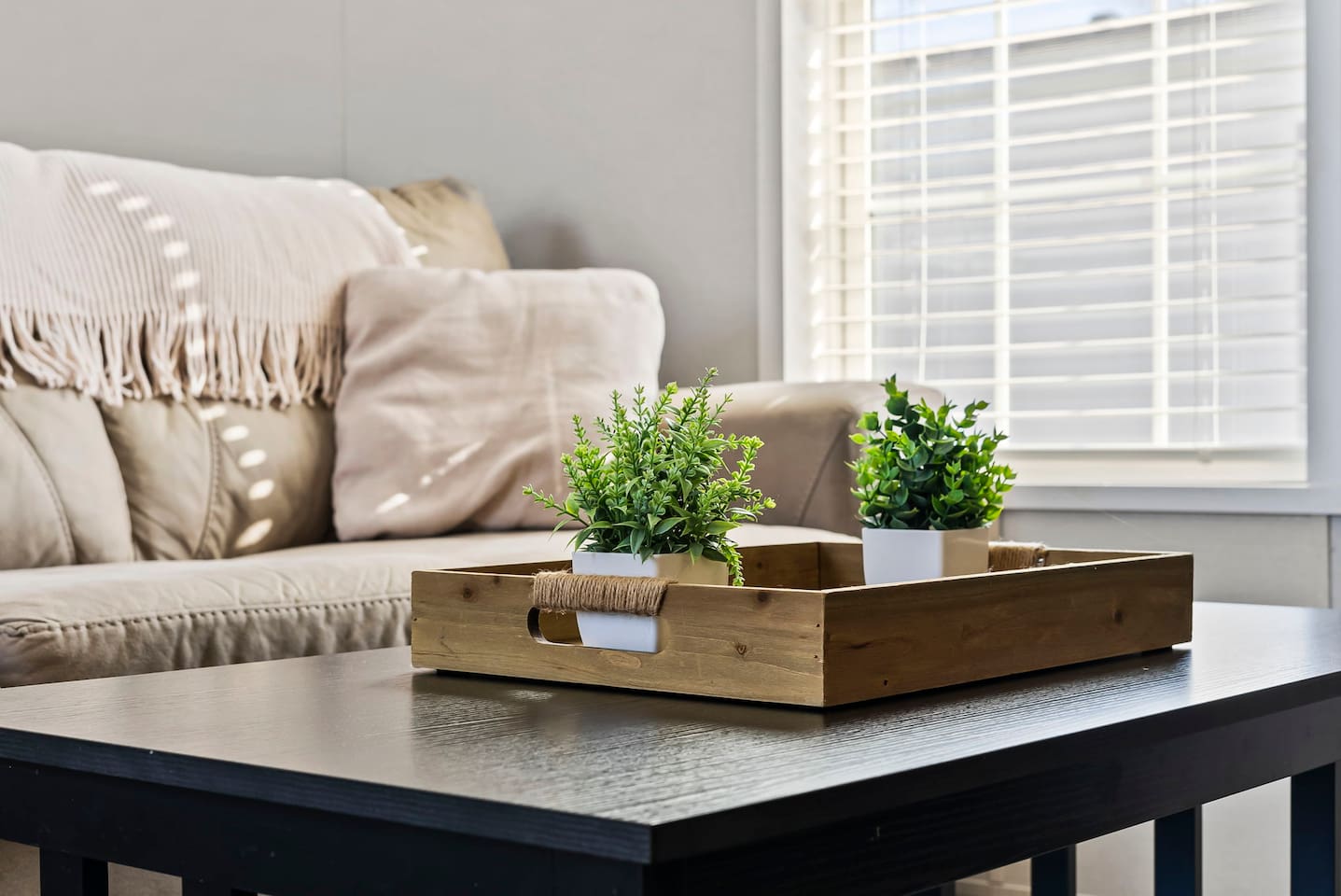Stylish coffee table with simple decor—adding a warm and welcoming touch to the living space.