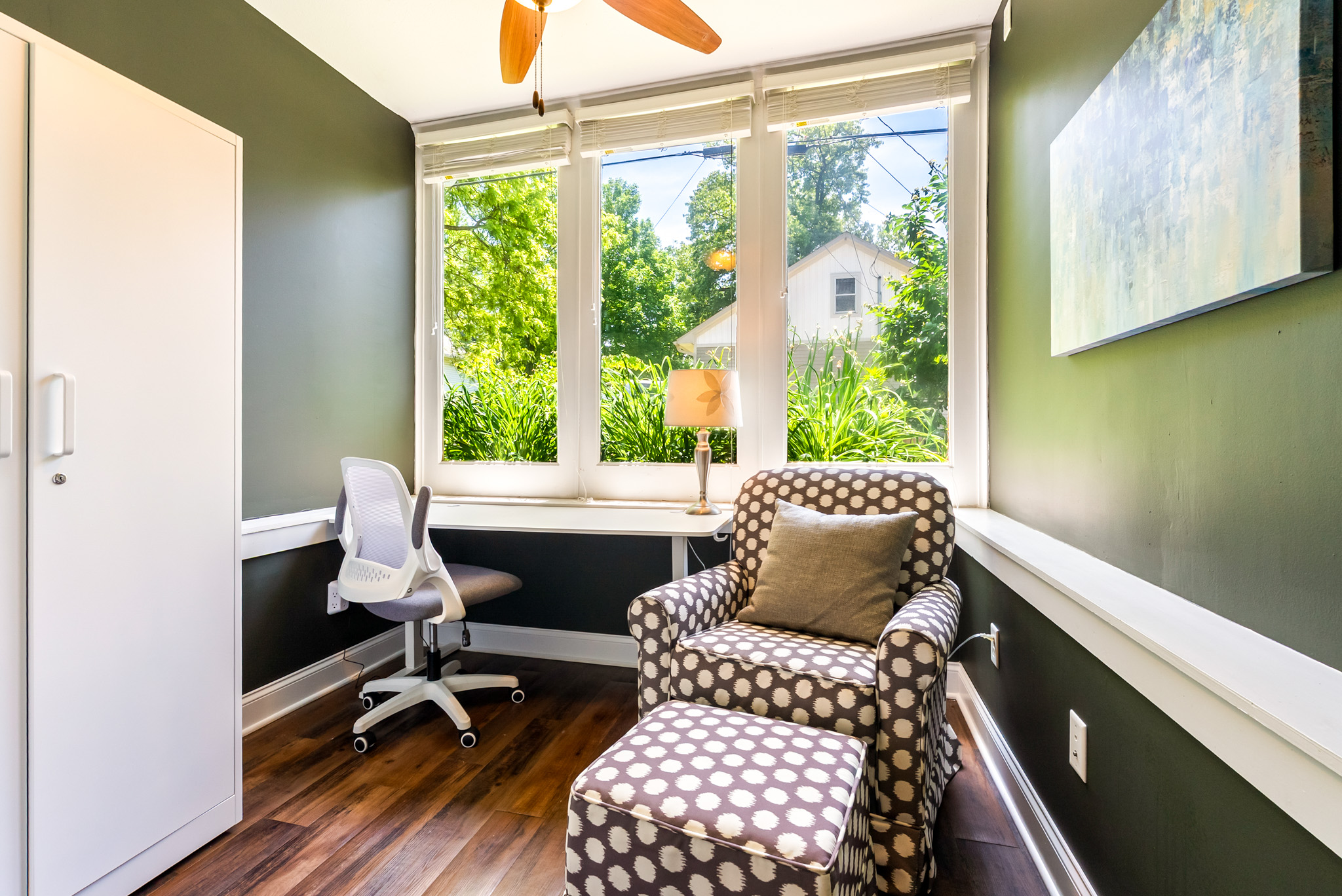 Log in with ease. The Garden Level Suite features a dedicated workspace tucked into a bright sunroom, complete with a spacious desk, comfortable chair, and fast Wi-Fi—perfect for remote work or study.