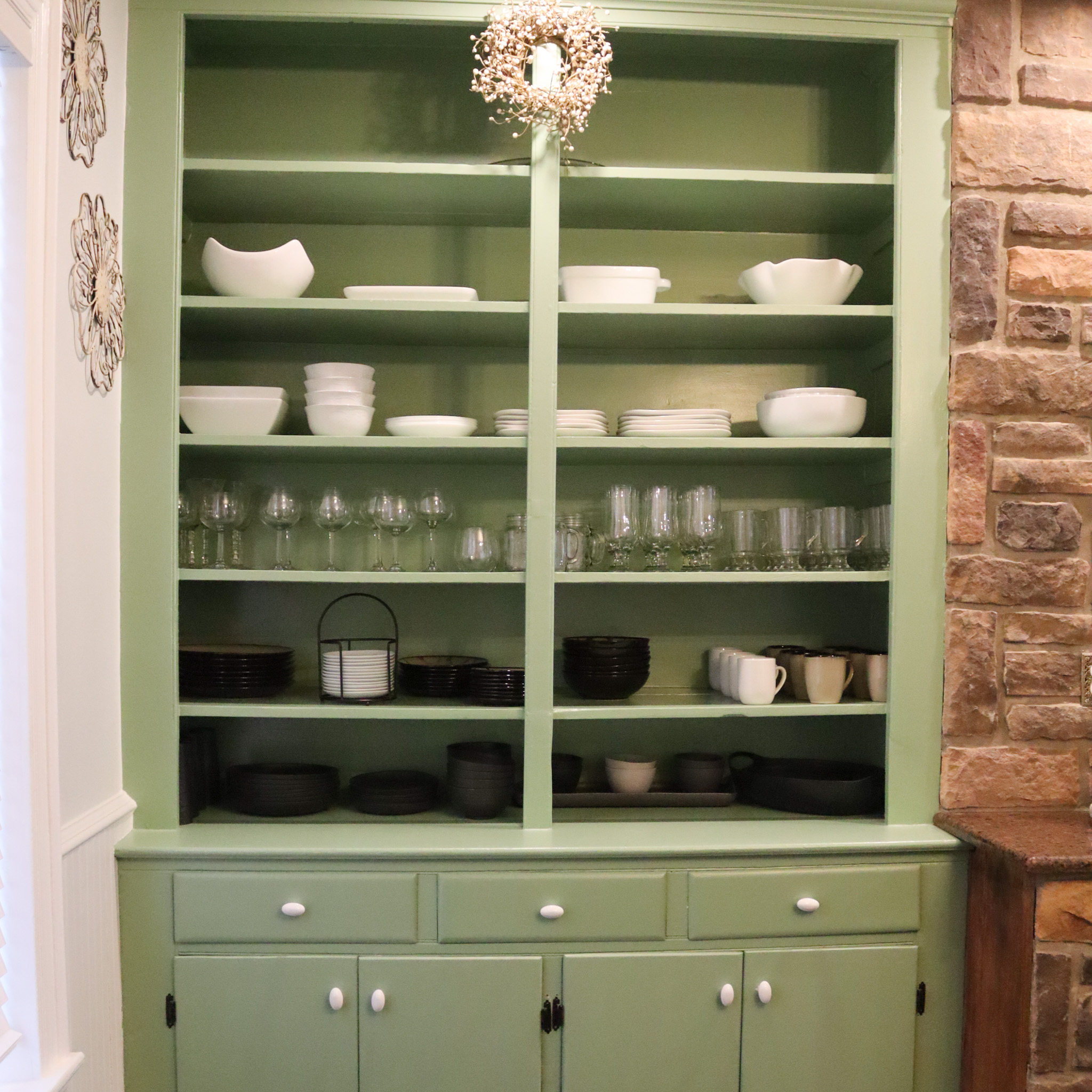 fully equipped kitchen with dishes