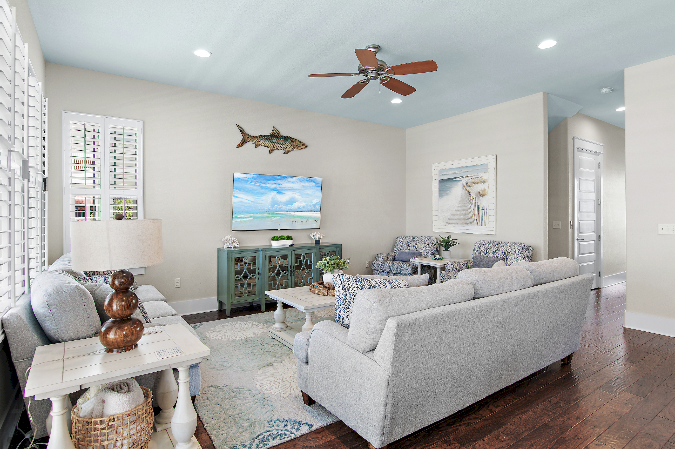 Gather with family and friends in this spacious, inviting retreat with beautiful 30A charm.