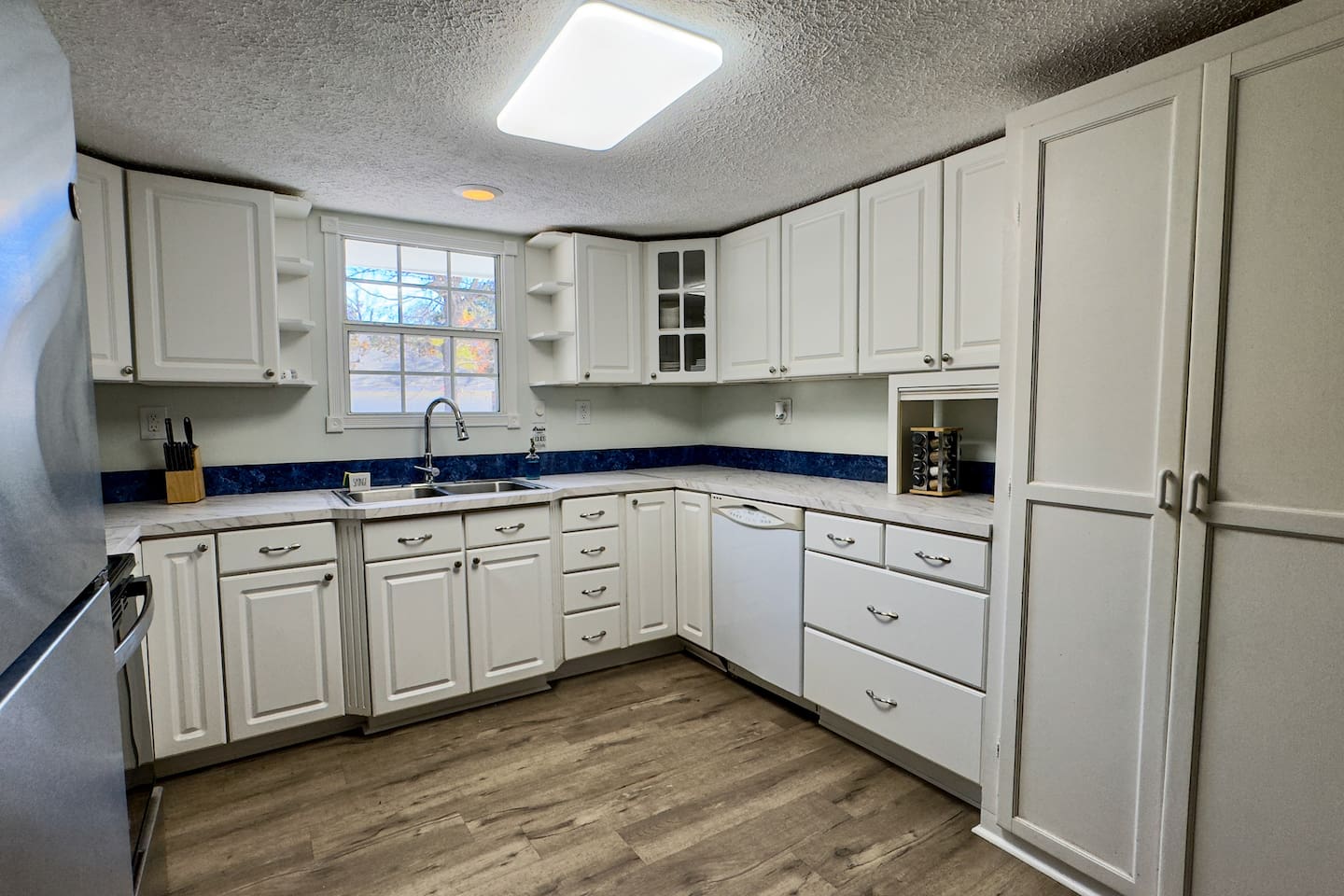 Start your day here—coffee brewing, sunlight streaming, and everything within reach.