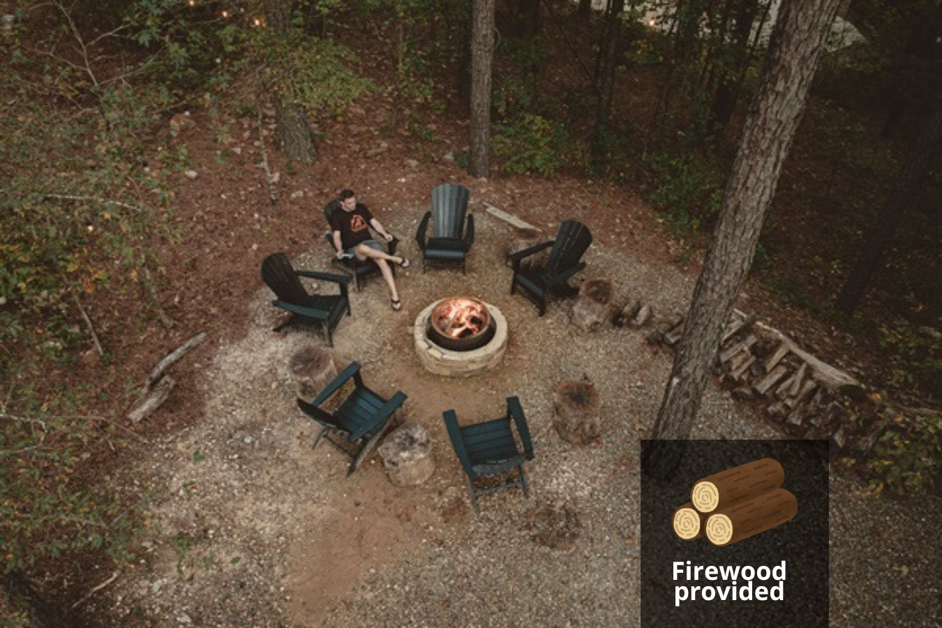Gather around a crackling fire pit, surrounded by comfortable Adirondack chairs in a scenic woodland setting. Perfect for stargazing, roasting marshmallows, and storytelling.