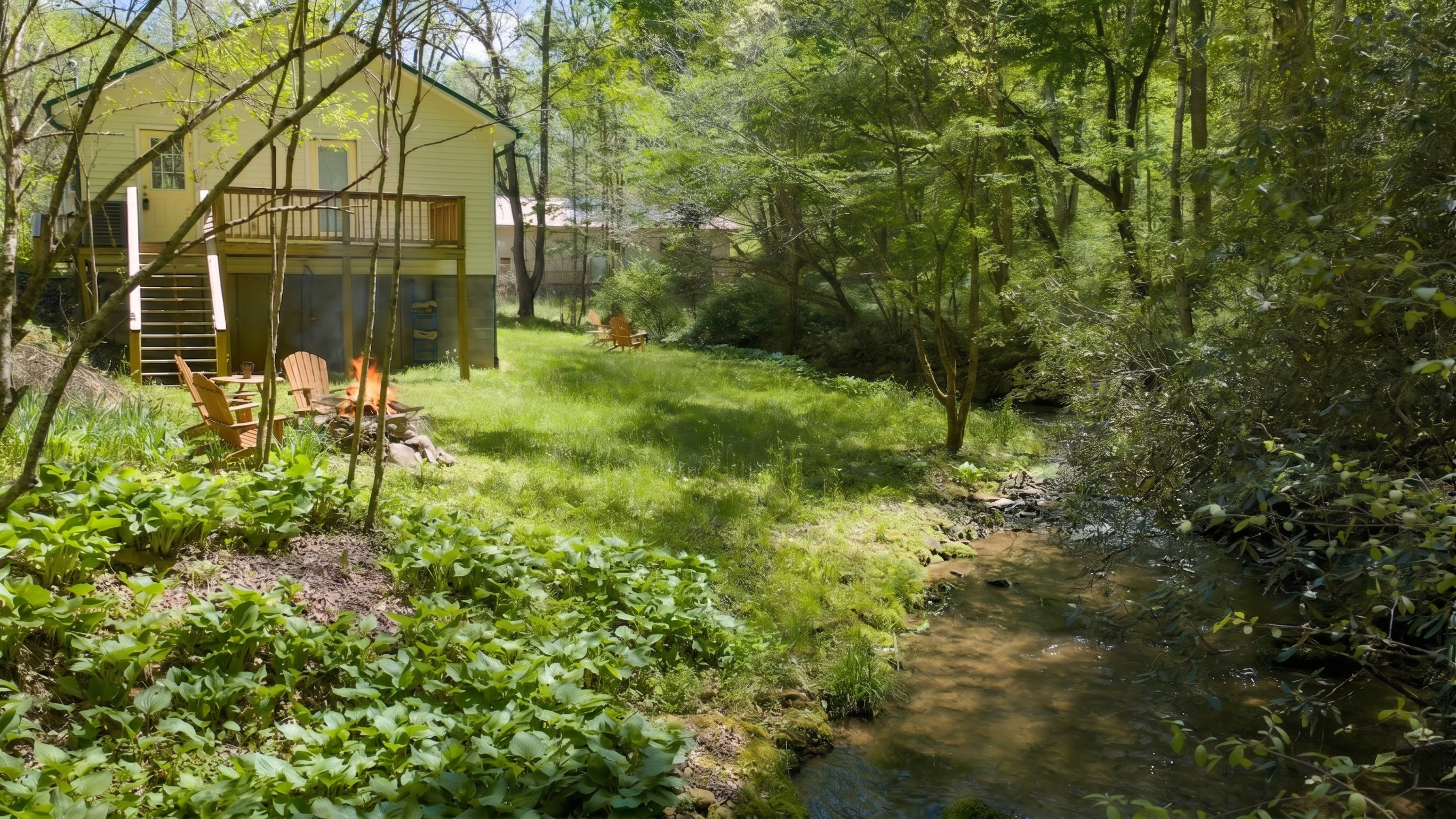 A true mountain experience, wood-burning fire pit beside Yellow Creek.
