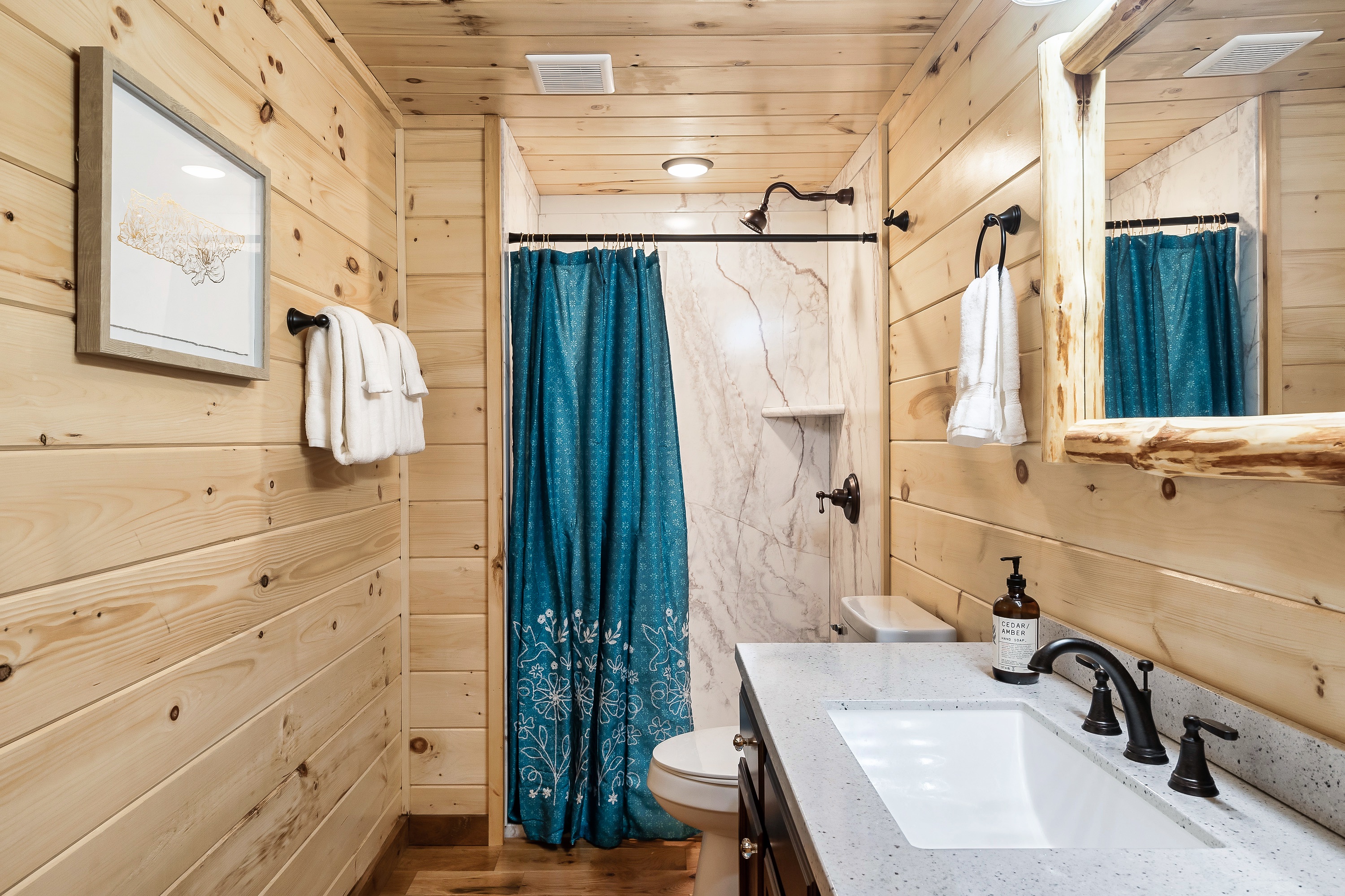 The "Hey Darlin" bathroom has a walk in shower