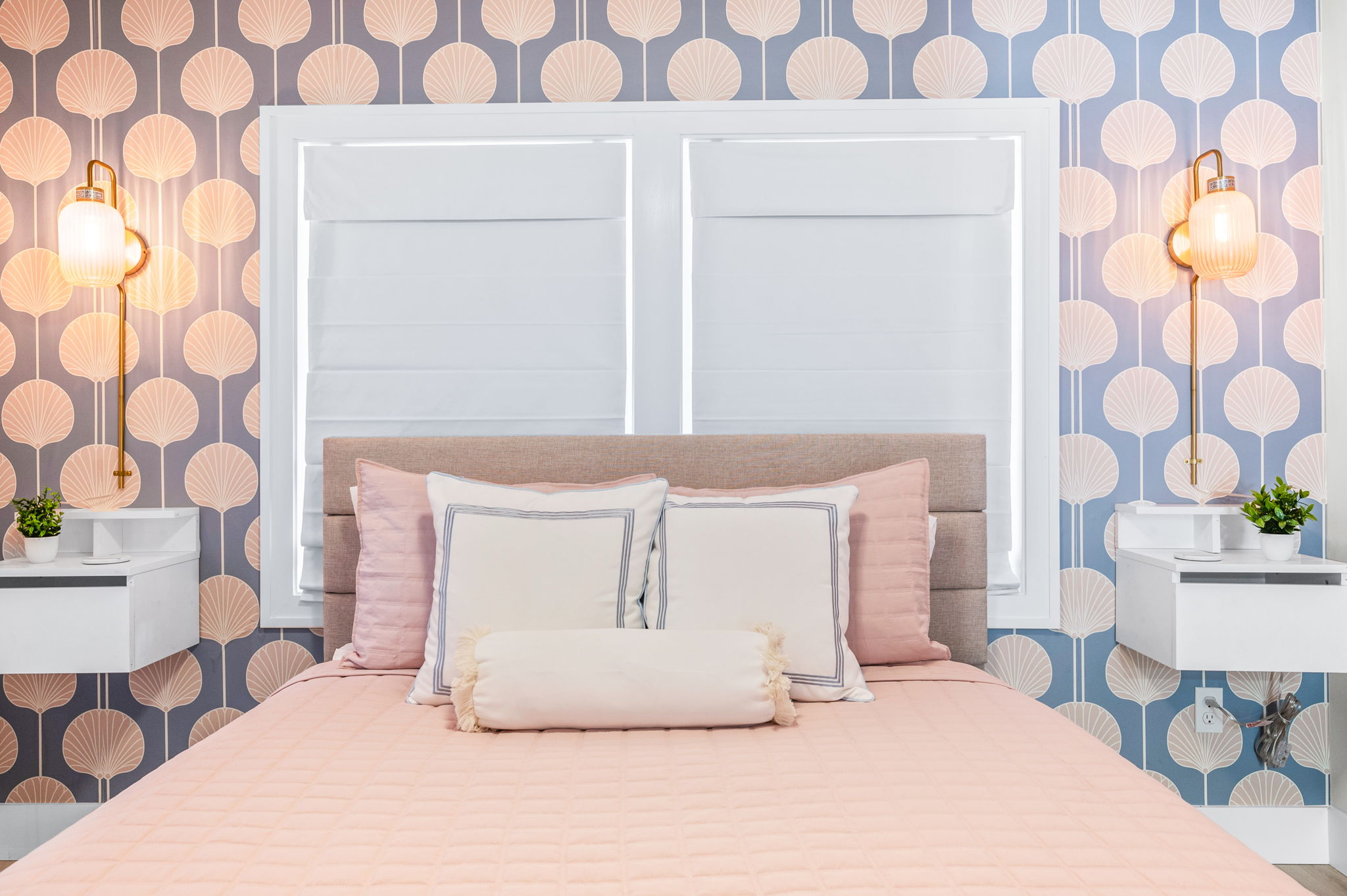 Perfect for an individual, couple, or family of four, this downstairs room features a cozy queen bed with two twin trundle beds tucked underneath. It shares a stunning bathroom with the bunk bed room, offering convenience and comfort for all!