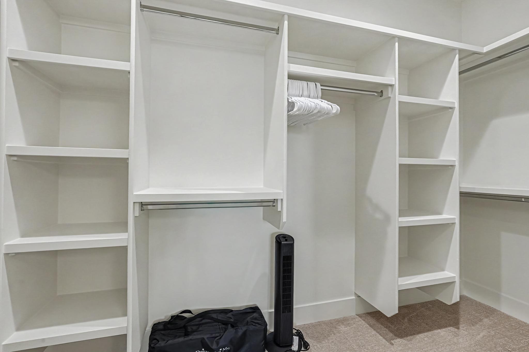Large primary bedroom with a spacious closet, providing plenty of storage for extended stays. Also features a pack-n-play with sheets.