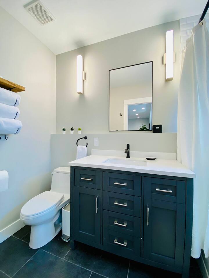 Our spa-inspired bathroom is stocked with thoughtful essentials — from a hair dryer to first aid — so you can pack light and feel right at home.