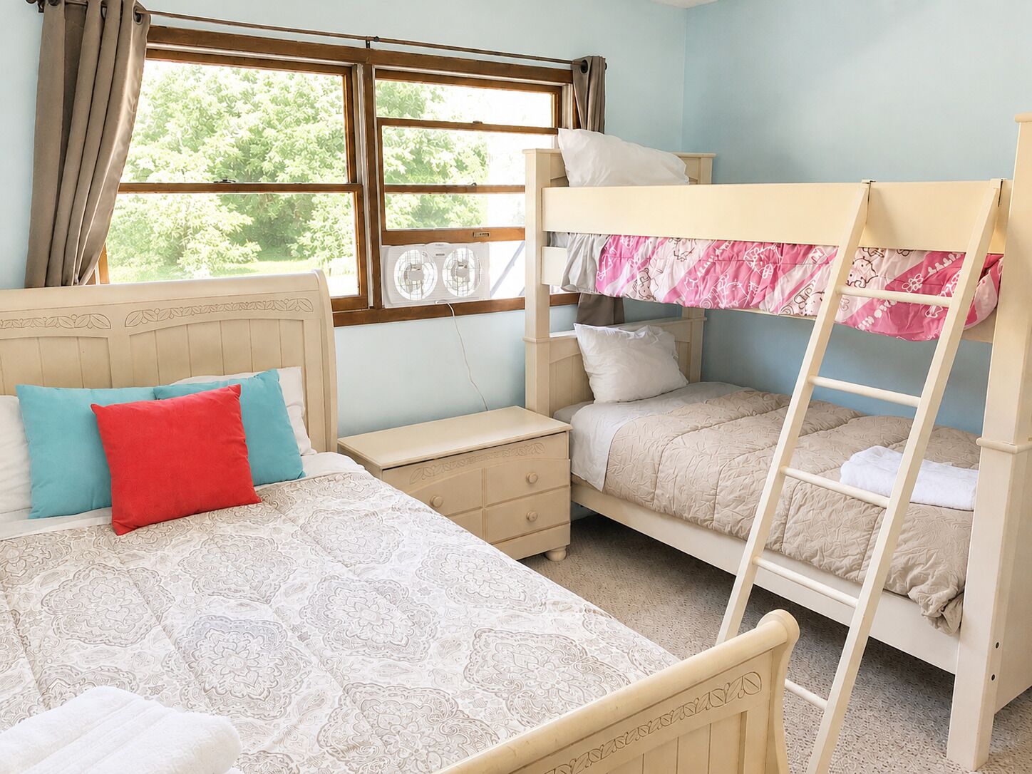 Great for kids, cousins, or friends traveling together, this room offers a full bed and twin bunk beds.
