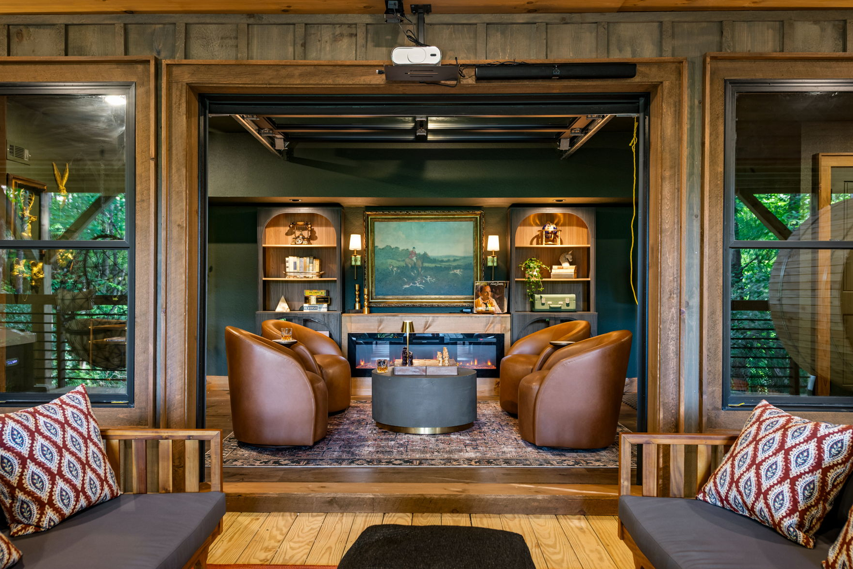 Lower level deck speakeasy with rollup garage door