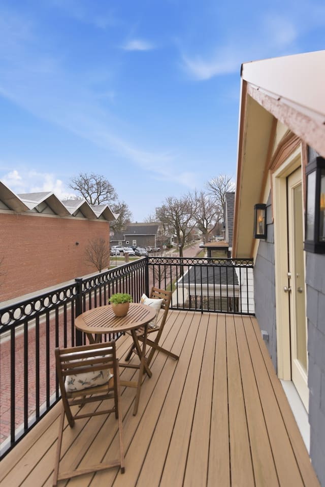 Private balcony with cozy seating, perfect for enjoying fresh air and city views