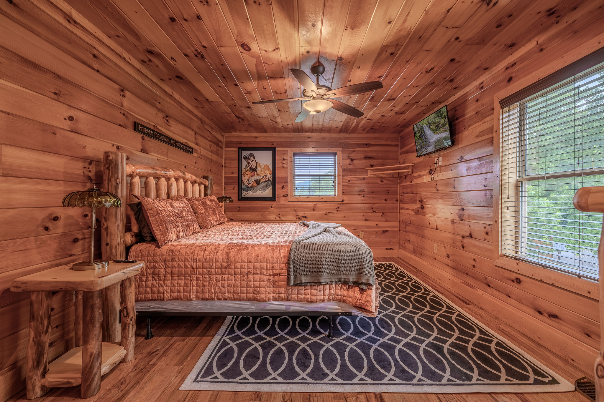 The Harmony Suite is an upper-level king bedroom with a calm, polished feel and private en-suite bathroom access.