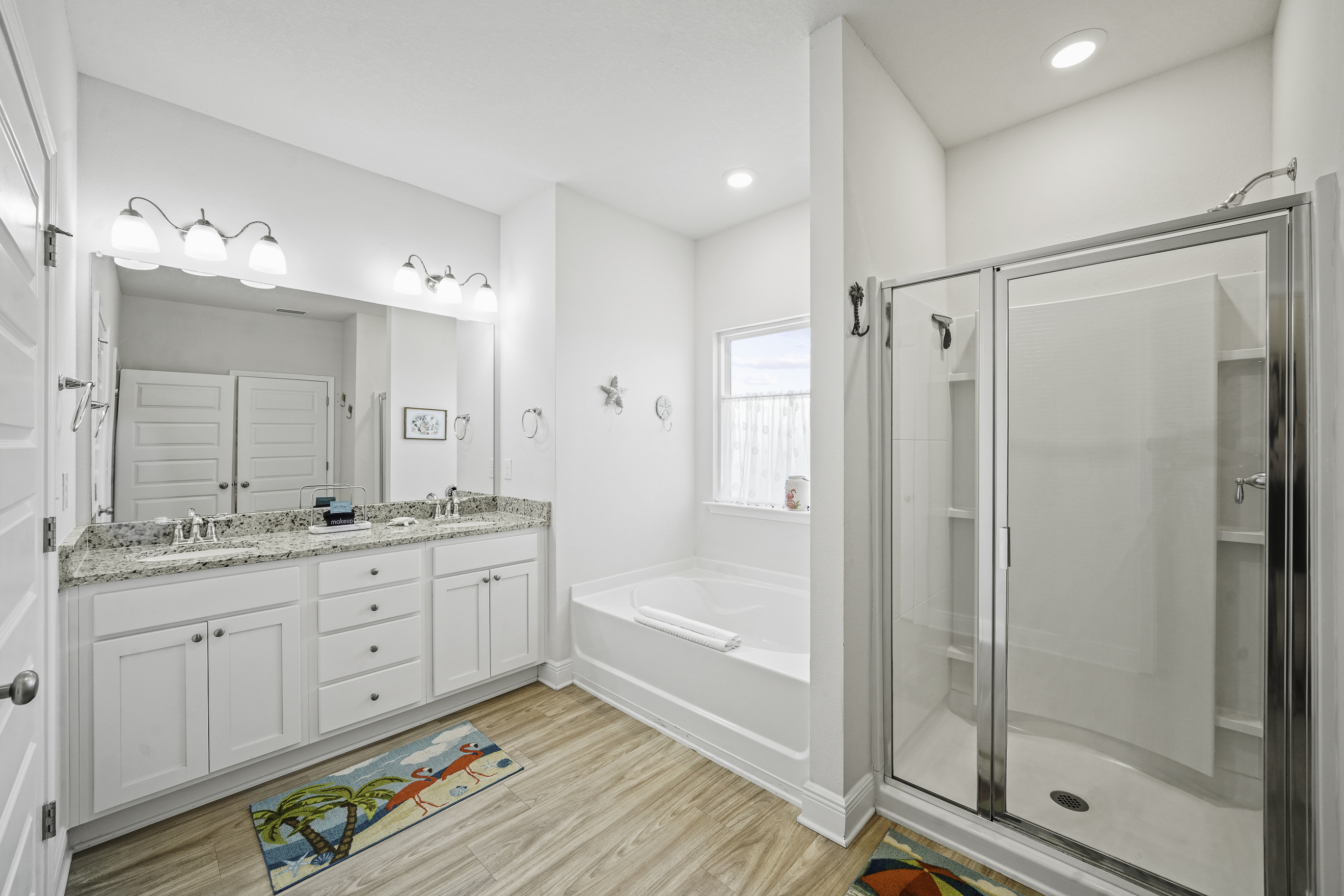 Dual sinks, tub and a walk-in shower perfect for busy mornings