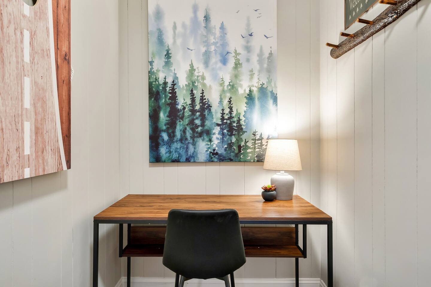 Cozy workspace meets Smoky Mountain inspiration in our Pigeon Forge home. Plan hikes or catch up on emails with this rustic-chic desk area. #FamilyFriendlyStay