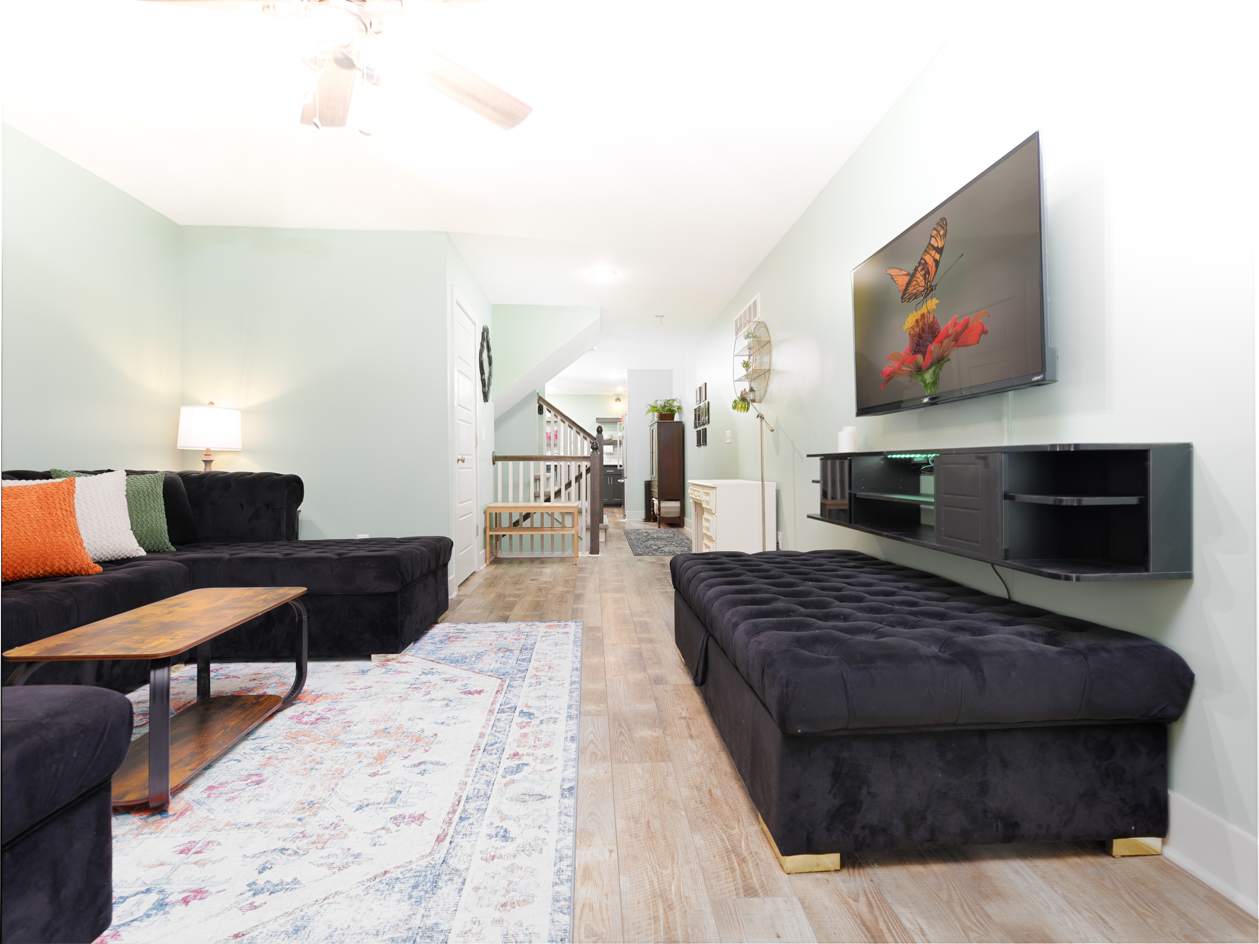 Open-concept main living area thoughtfully designed for seamless flow between the living room, dining space, and kitchen.
