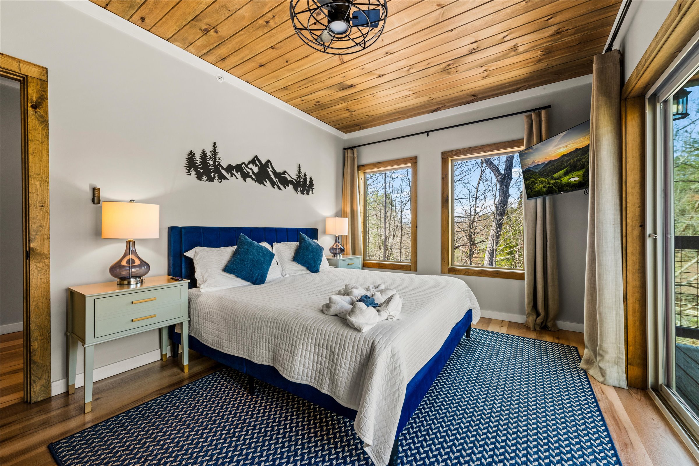 The bedroom includes a Smart TV and additional closet space for storage.