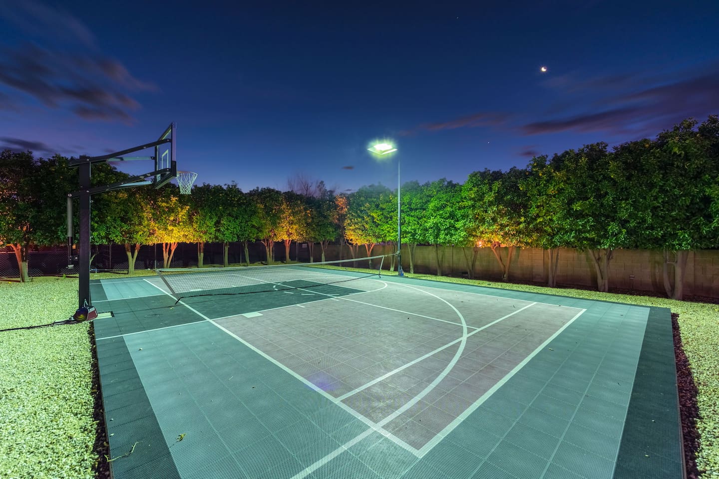 This night-lit court ensures the fun continues long after the sun sets.

