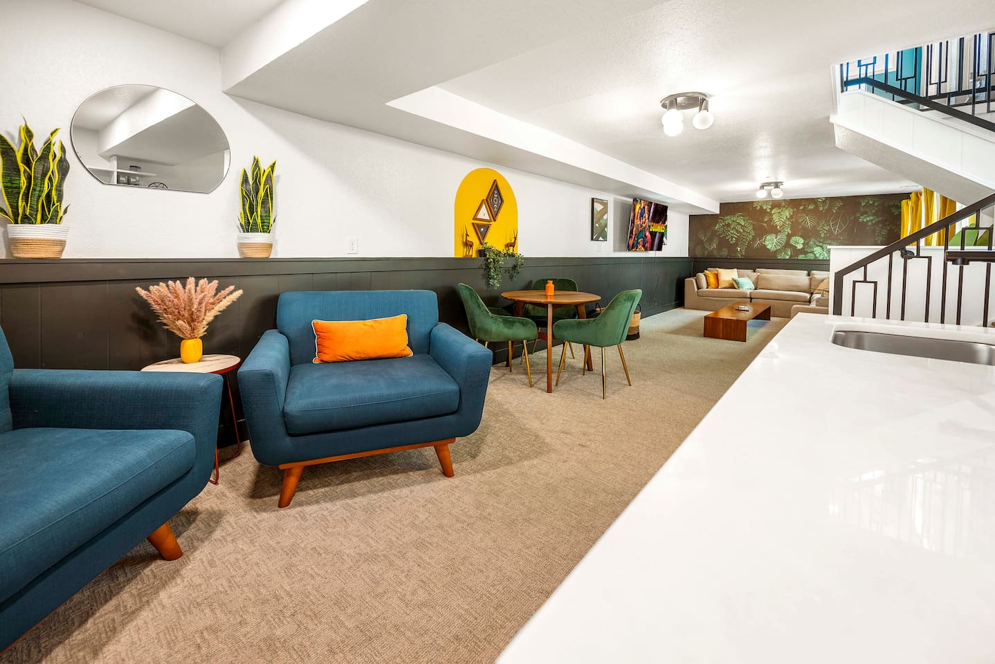 Retro inspired lounge with mid century vibes perfect for catching up.