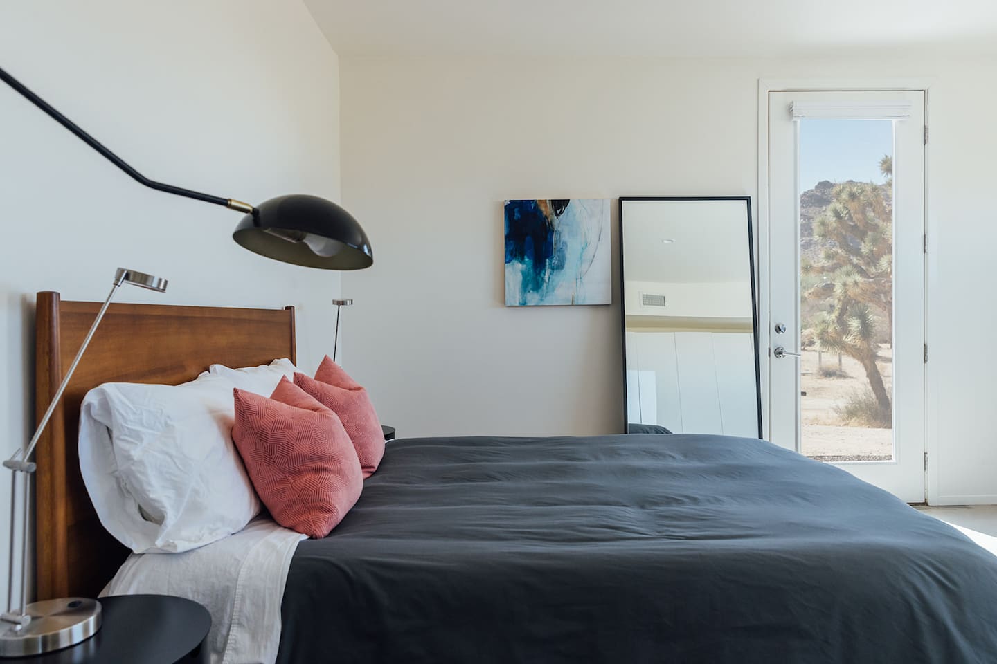 Bedroom with separate entrance for ease, facing the front of the home.