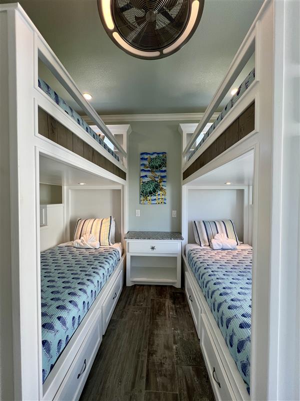Crystal Paradise Bedroom 5: Private bedroom featuring two twin bunk beds and ensuite bath.