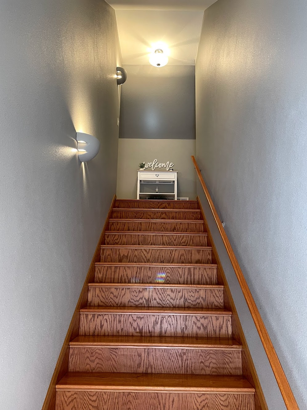 stairs to second level    *note bedroom is on the main lower entry level must take stairs to access upper loft kitchen living bathroom* 