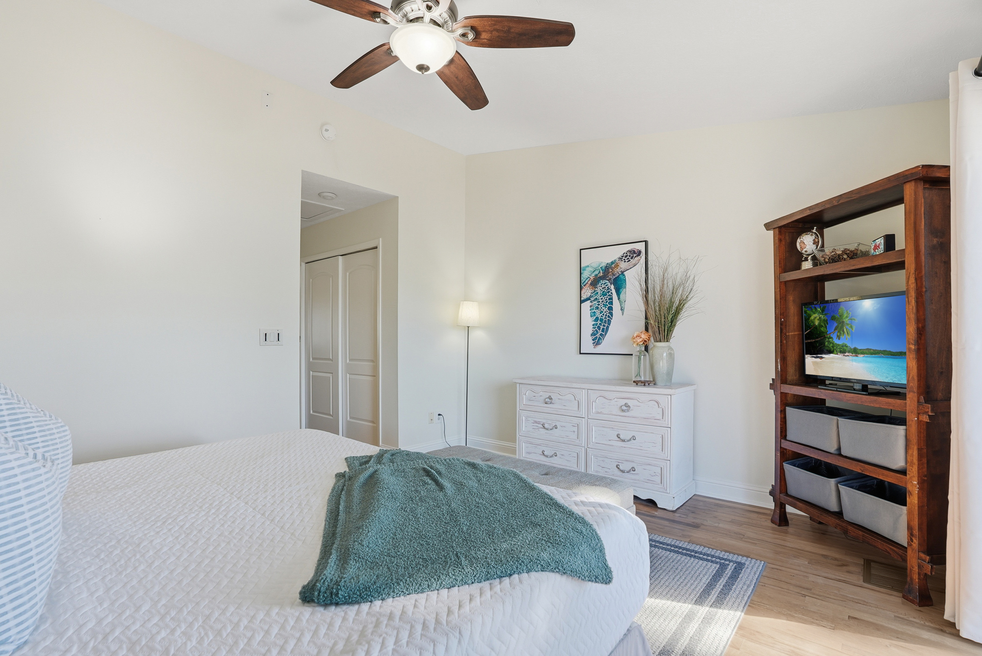 Bedroom #1 with King Bed and Balcony Access Overlooking the Back Yard