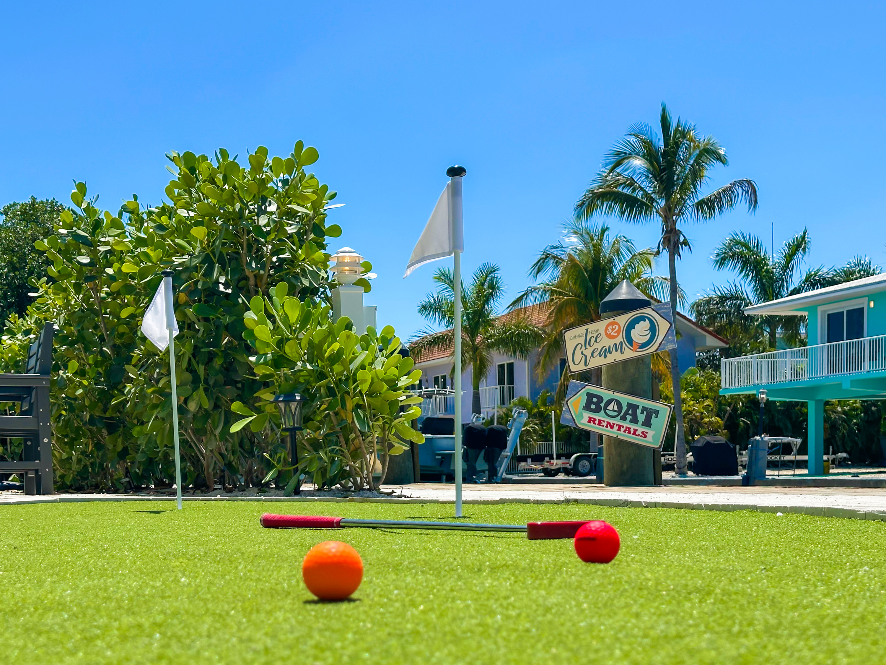 Entertainment inside and outside, like a putting green by the water.